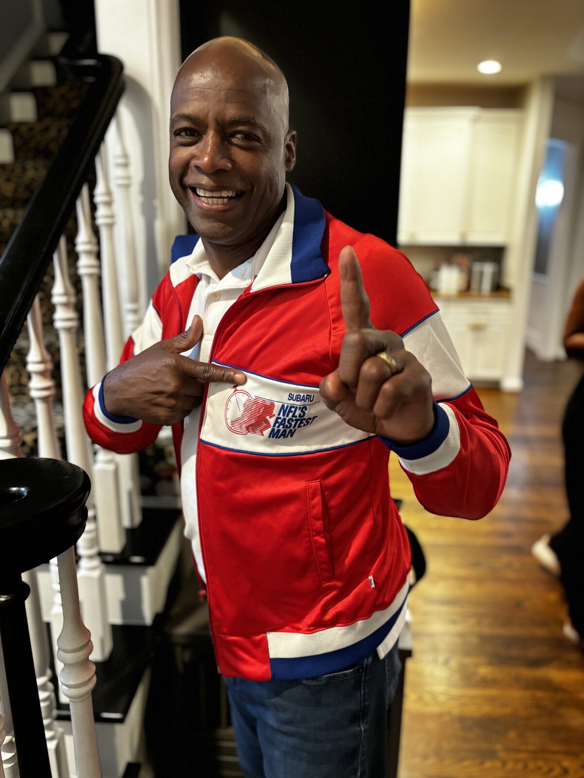 Darrell Green wearing his NFL's Fastest Man jacket